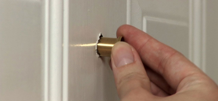peephole door repair in Coral Terrace